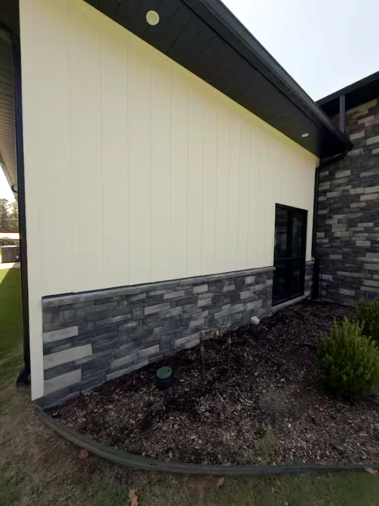 Commercial building stone wall in Heber Springs, Arkansas after soft washing — clean, streak-free exterior