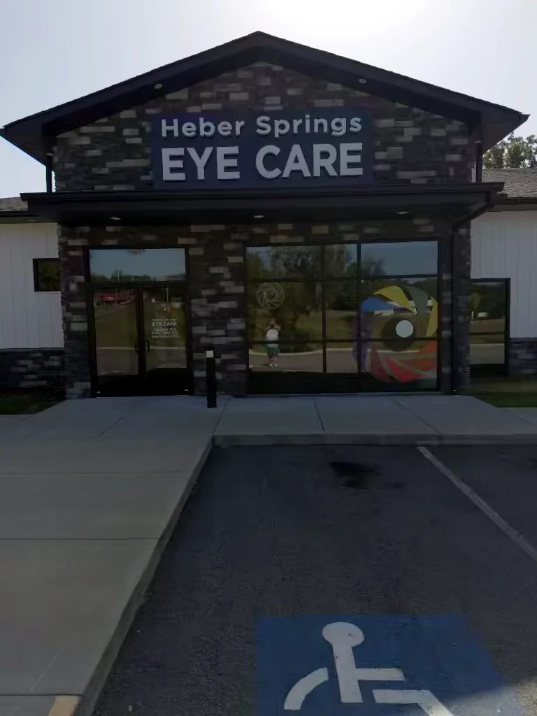 Commercial building entrance in Heber Springs, Arkansas before soft washing — algae and weather staining on the exterior