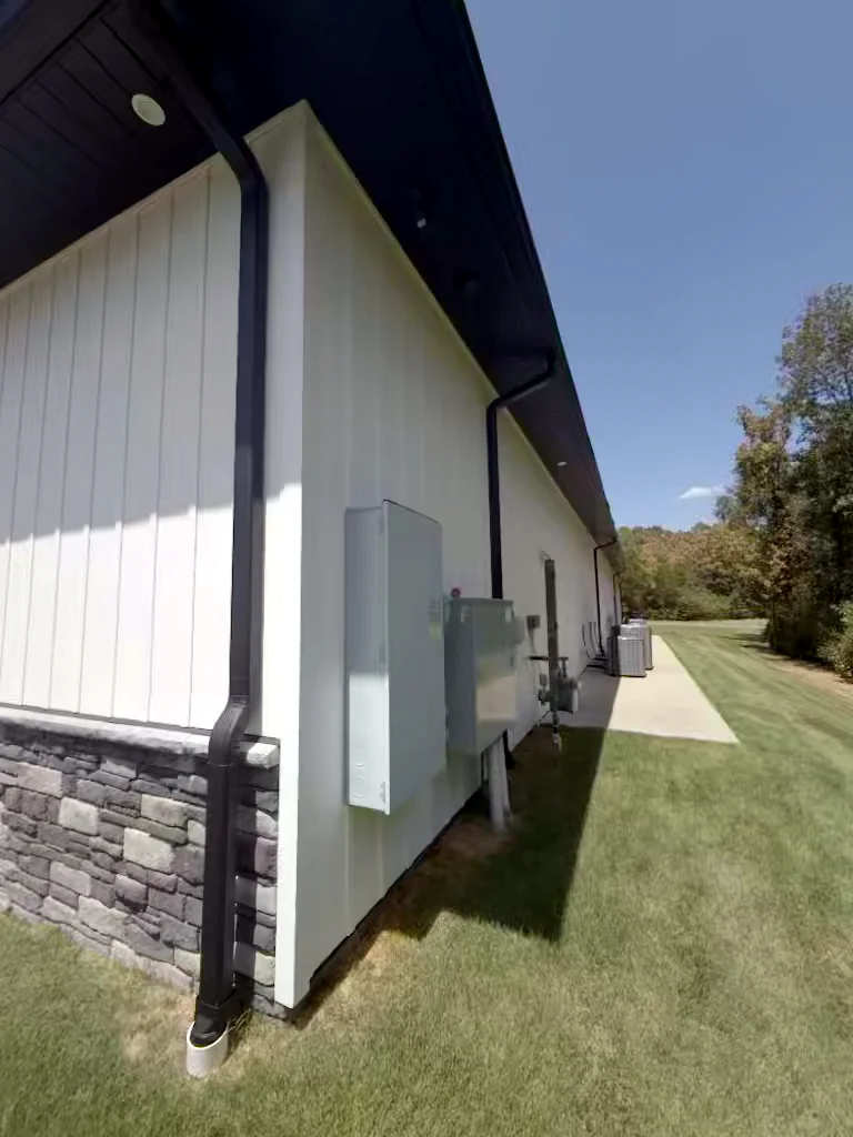 Commercial building utility side in Heber Springs, Arkansas after soft washing — clean, streak-free exterior
