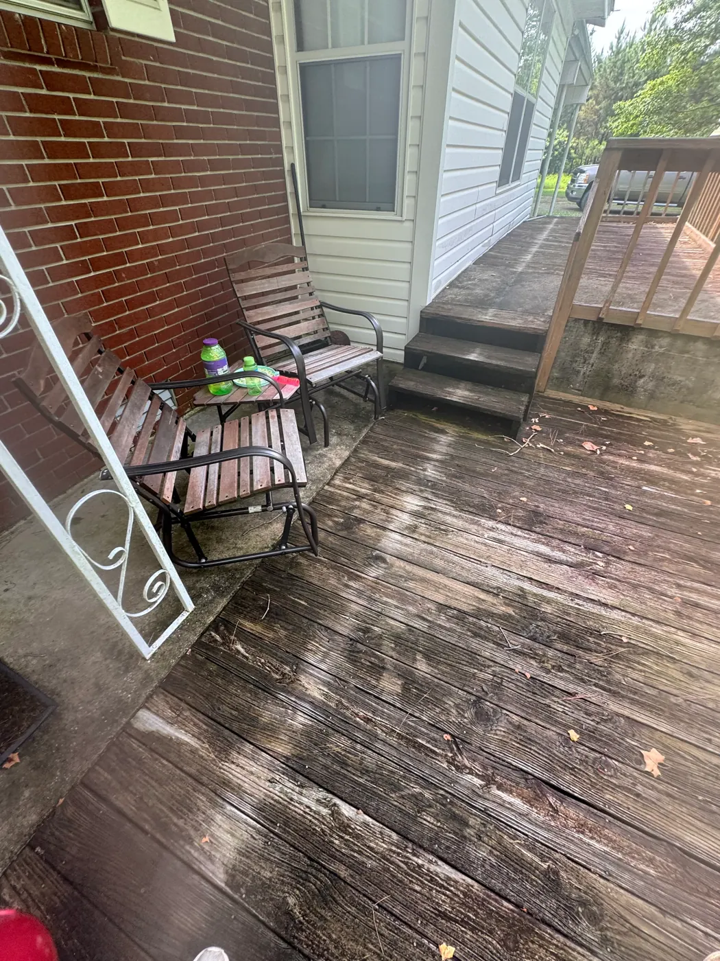 Backyard patio and deck area cleaned by Natural State Soft Wash in Heber Springs